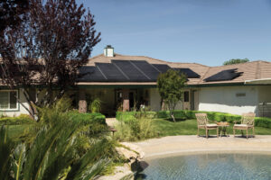 image of home with solar panels on roof